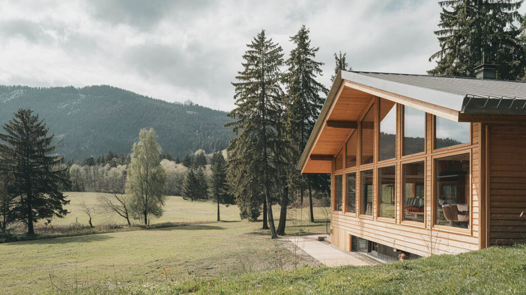 Cabin on large grass meadow